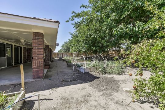 1257 Carolyn Street Ridgecrest, CA 93555 - Photo 39 of 42 a view of a house with a tree