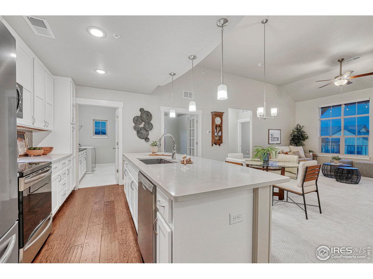 6582 Crystal Downs Drive, Unit 207 Windsor, CO 80550 - Photo 11 of 40 Ample counter space and cabinet storage