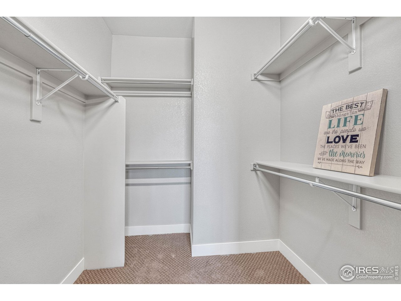 6582 Crystal Downs Drive, Unit 207 Windsor, CO 80550 - Photo 26 of 40 Gigantic walk in closet ready for your wardrobe