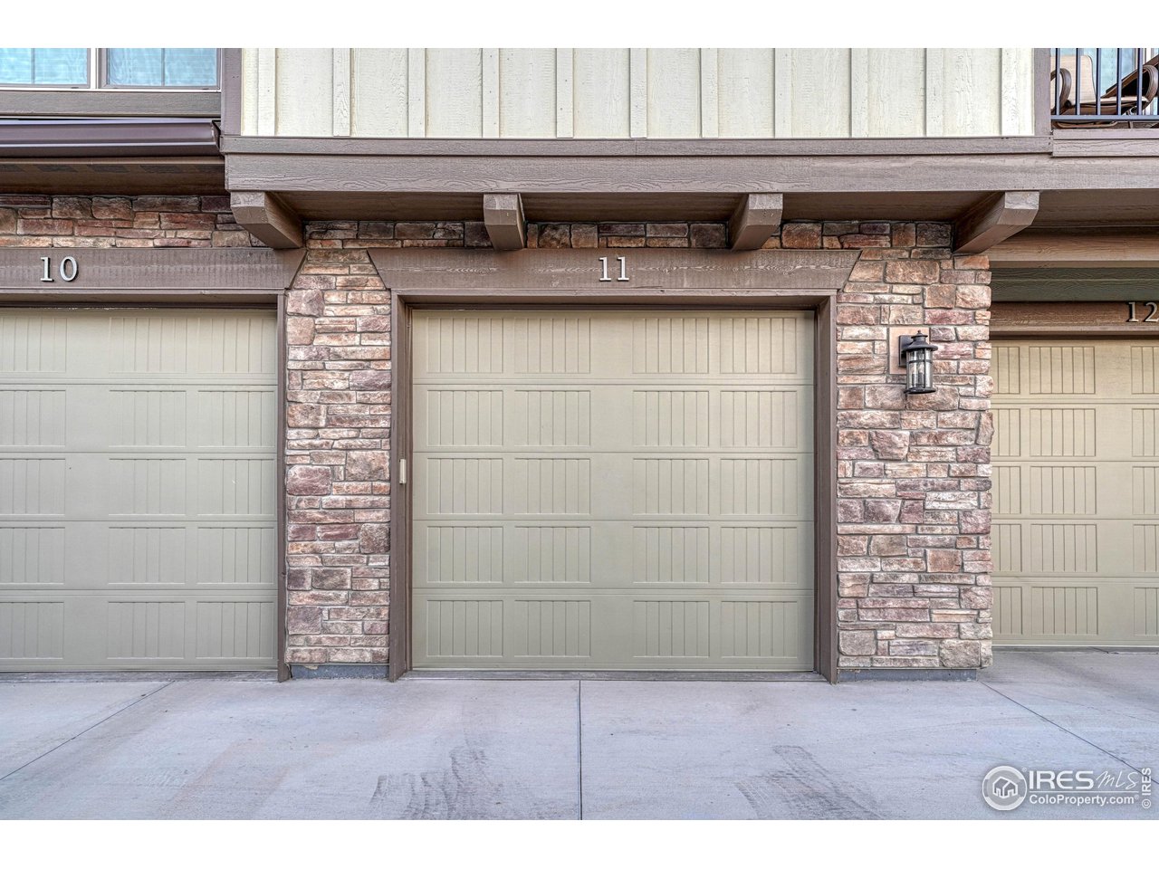 6582 Crystal Downs Drive, Unit 207 Windsor, CO 80550 - Photo 32 of 40 Garage #11 (has access to interior hallway that leads to elevator or stairways. Parking is permitted in front of your garage door/space