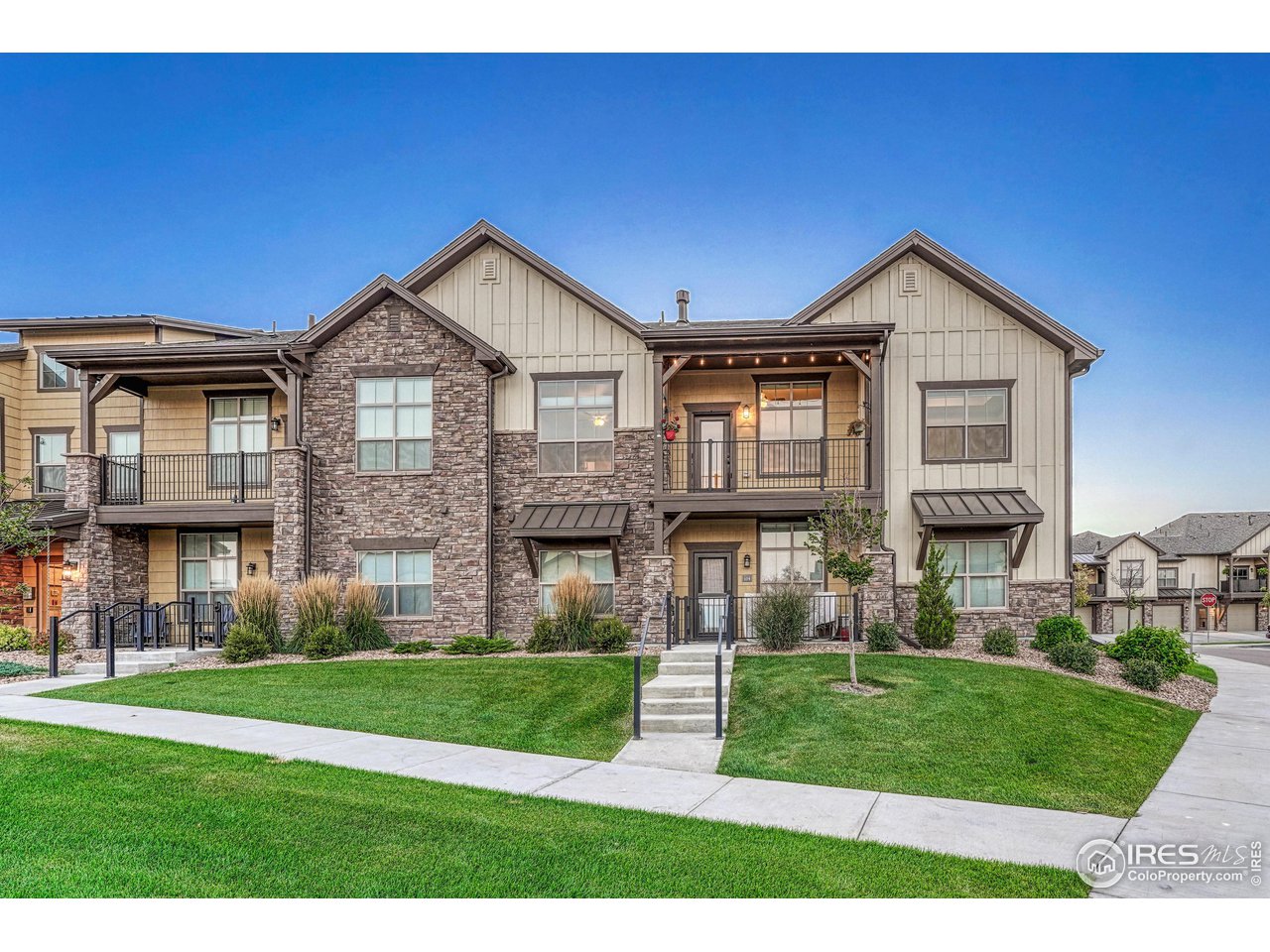 6582 Crystal Downs Drive, Unit 207 Windsor, CO 80550 - Photo 33 of 40 Lobby entrance on main level to the south of unit. Secure