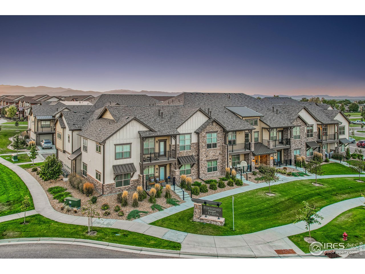 6582 Crystal Downs Drive, Unit 207 Windsor, CO 80550 - Photo 34 of 40 Building #7 at Portofino Flats at LaRiva. Private, secure, and handicap accessible for resort style living