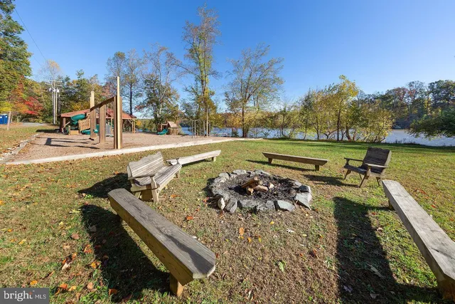 a view of a lake with wooden stairs