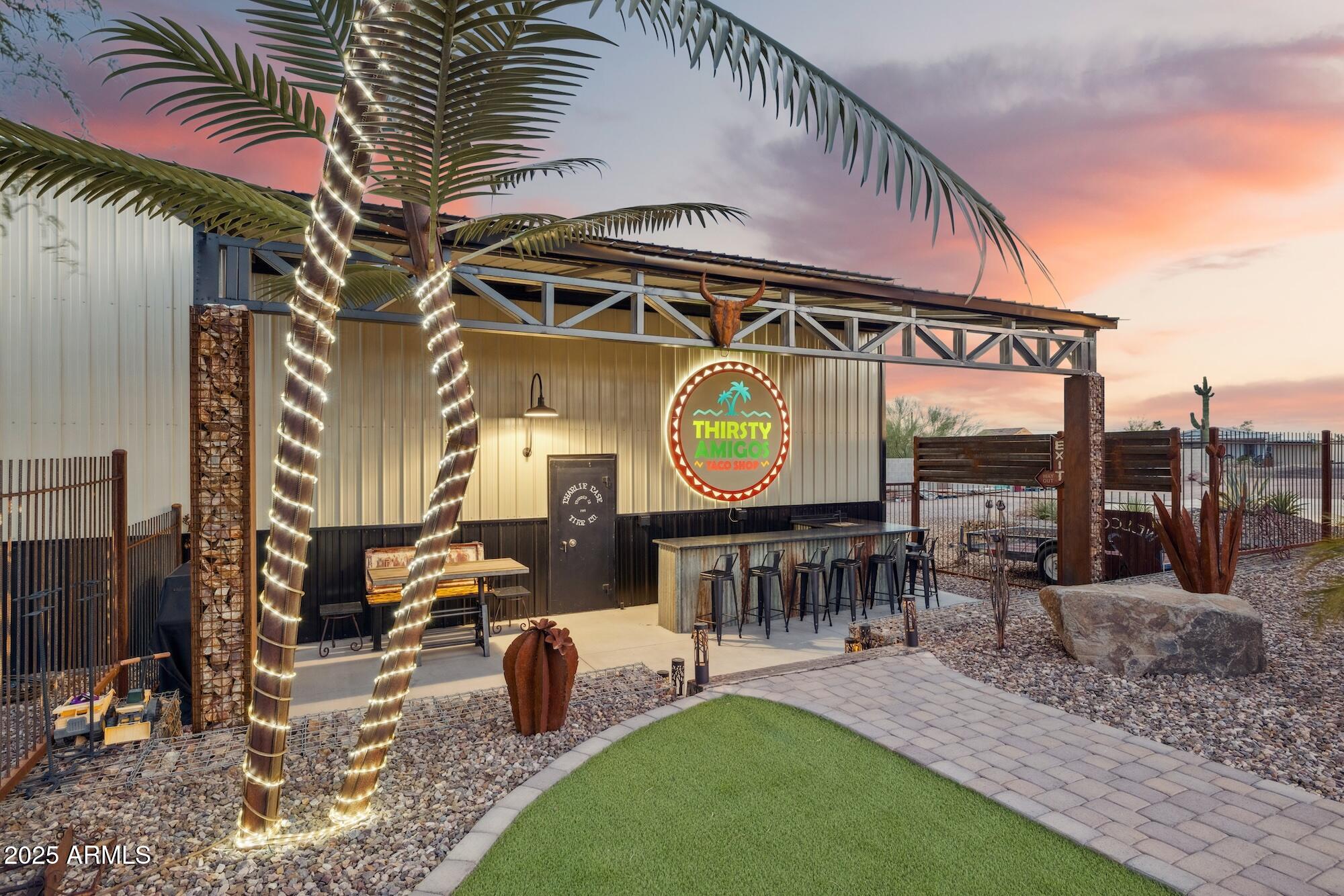 655 South Conestoga Road Apache Junction, AZ 85119 - Photo 11 of 79 a view of a chairs and table in the patio