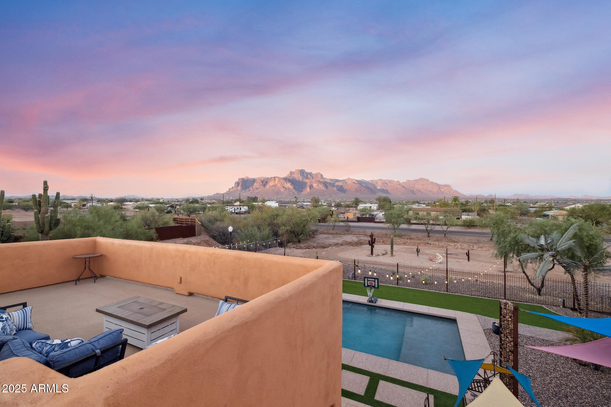 655 South Conestoga Road Apache Junction, AZ 85119 - Photo 60 of 79 a view of a roof deck with couches and sky view
