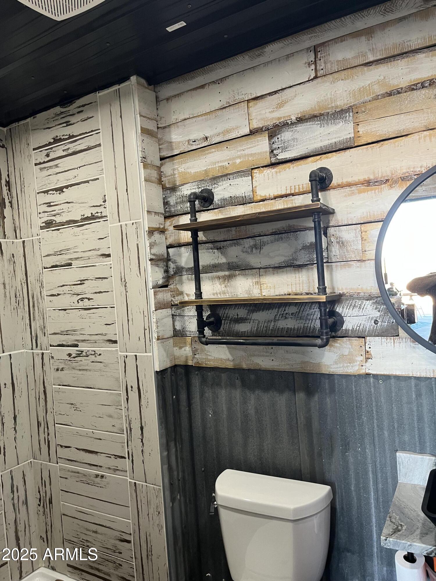 655 South Conestoga Road Apache Junction, AZ 85119 - Photo 67 of 79 a bathroom with a toilet and a shower