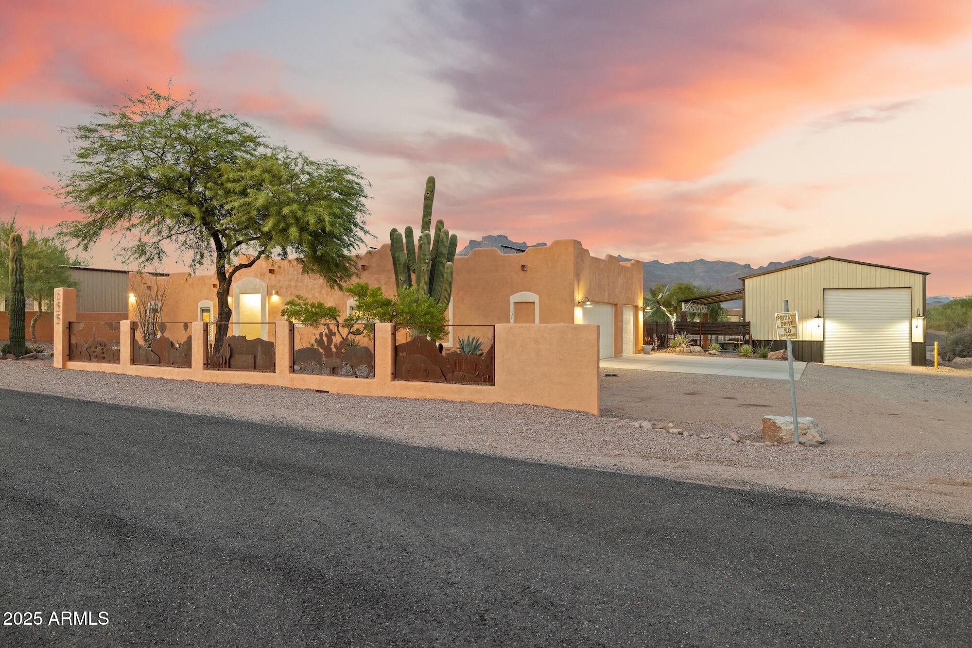 655 South Conestoga Road Apache Junction, AZ 85119 - Photo 7 of 79 a view of a street with a houses
