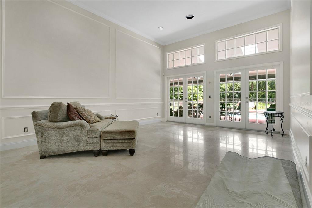 11056 Clipper Court Windermere, FL 34786 - Photo 5 of 18 a living room with furniture and wooden floor