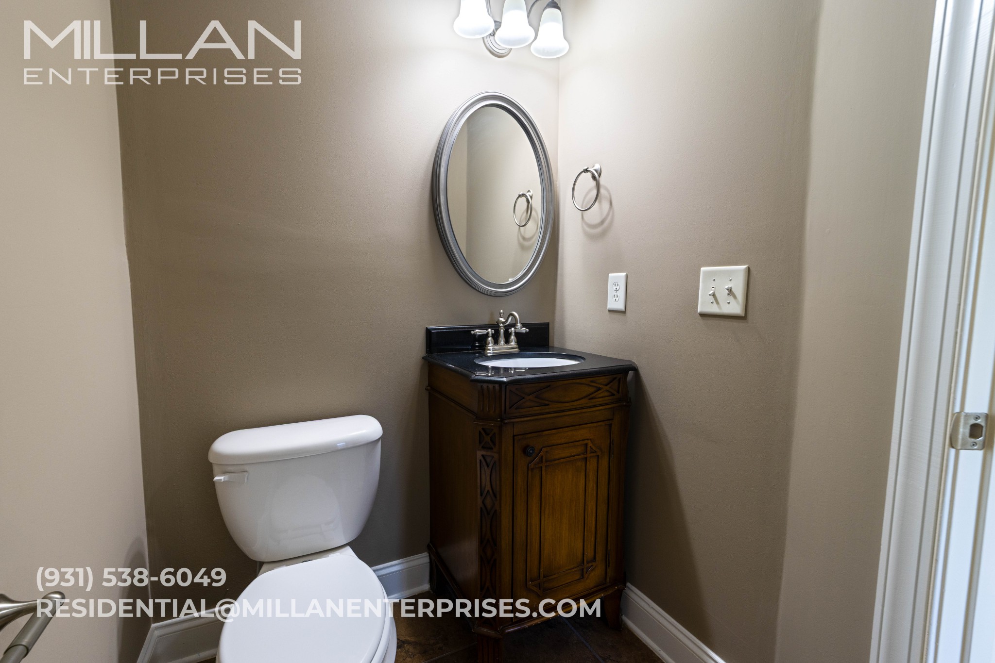 3564 Drake Road Adams, TN 37010 - Photo 18 of 26 a bathroom with a toilet a sink and a mirror