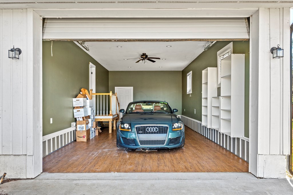 2040 Maples Branch Road Sevierville, TN 37876 - Photo 38 of 40 a living room with a bed and a window