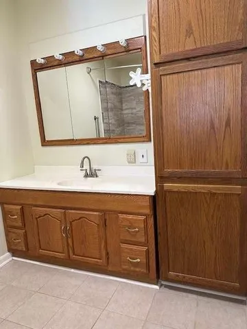 a view of an empty room with stairs