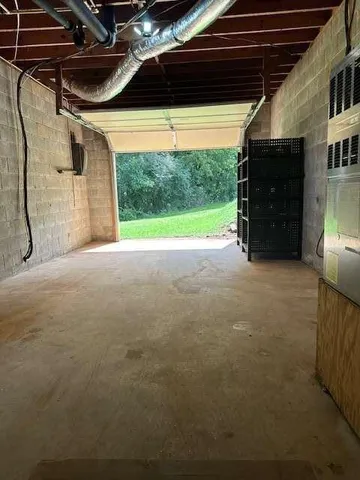 a house with huge green field in front of it