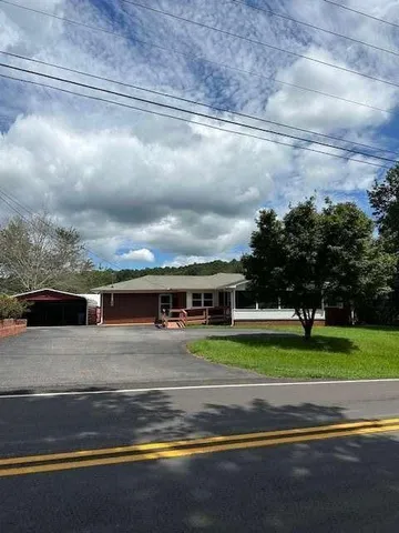 a view of building with yard