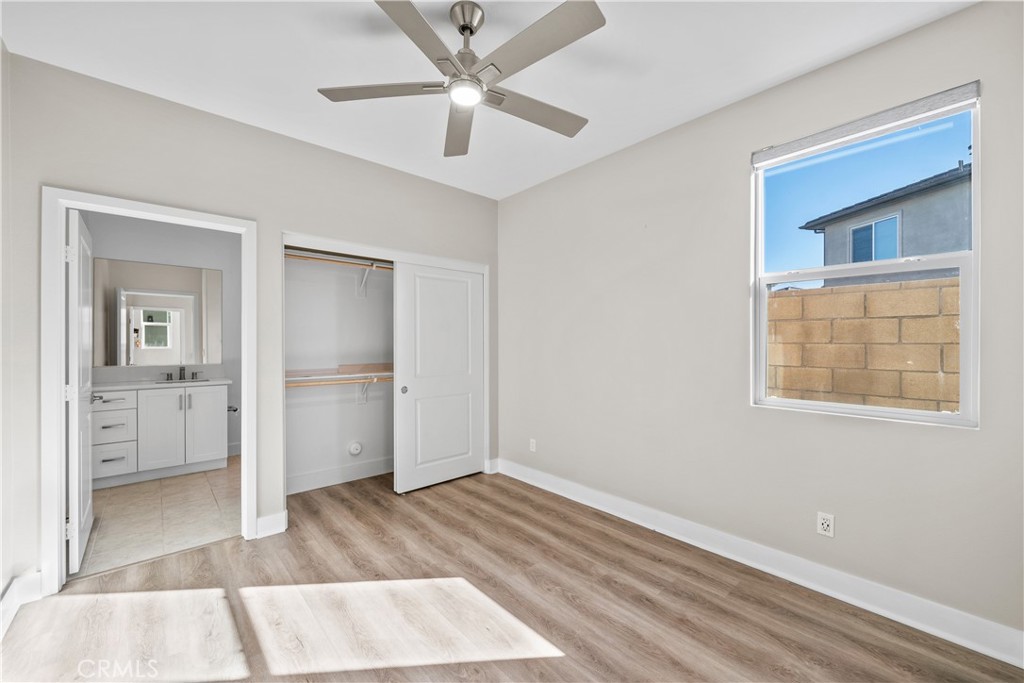 124 Zawn Irvine, CA 92618 - Photo 20 of 56 wooden floor in an empty room with a window