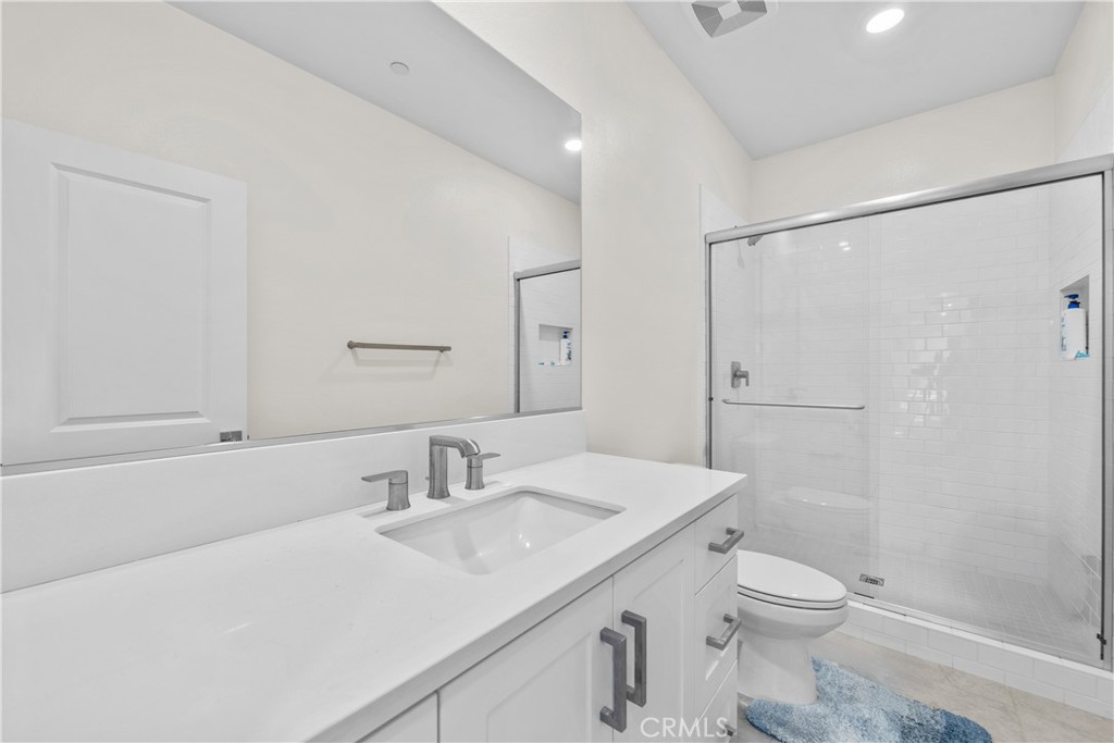 124 Zawn Irvine, CA 92618 - Photo 30 of 56 a bathroom with a sink a toilet and shower