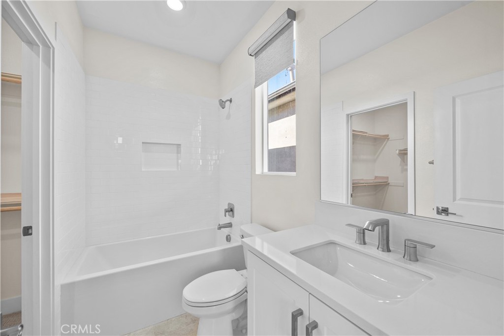 124 Zawn Irvine, CA 92618 - Photo 32 of 56 a bathroom with a sink a toilet and shower