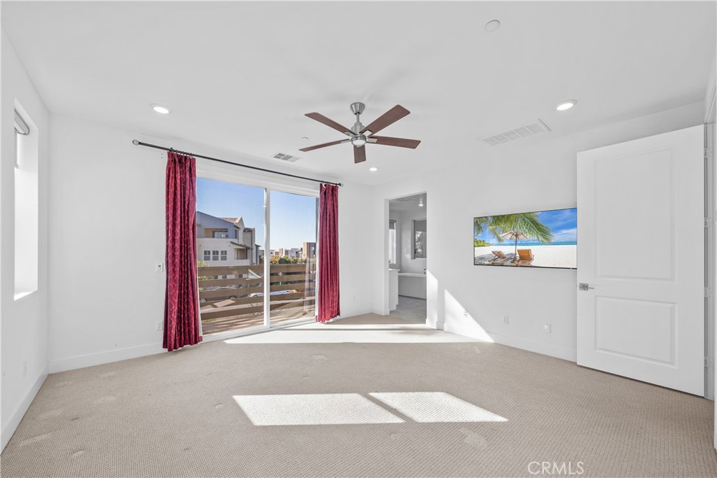124 Zawn Irvine, CA 92618 - Photo 34 of 56 a view of a livingroom with a ceiling fan
