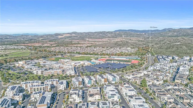 a view of a brick house with a patio