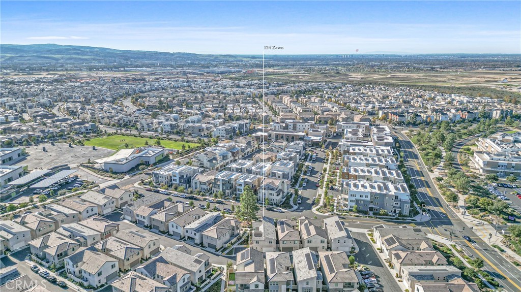 124 Zawn Irvine, CA 92618 - Photo 53 of 56 an aerial view of a city with ocean