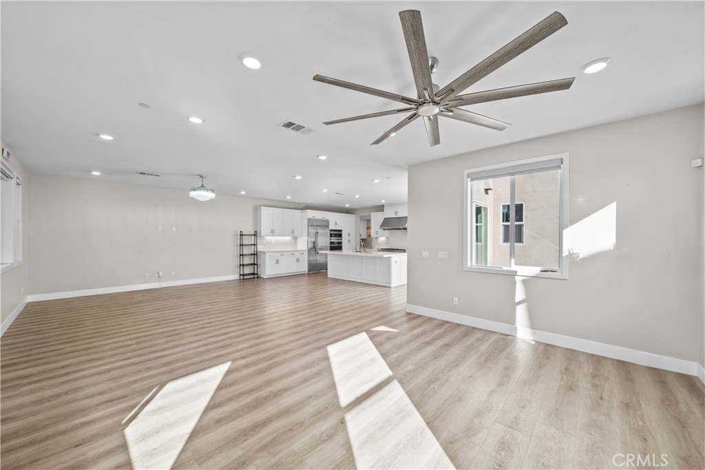 124 Zawn Irvine, CA 92618 - Photo 8 of 56 a view of a living room a sink and a window