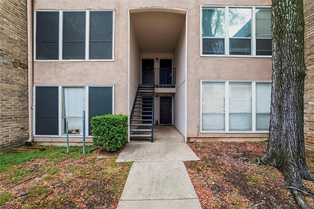5604 Boca Raton Boulevard, Unit 248 Fort Worth, TX 76112 - Photo 1 of 25 front view of a house with a yard