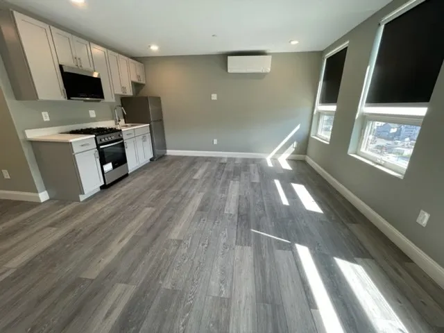 a view of kitchen and microwave