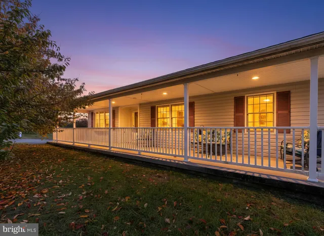 a view of backyard with deck