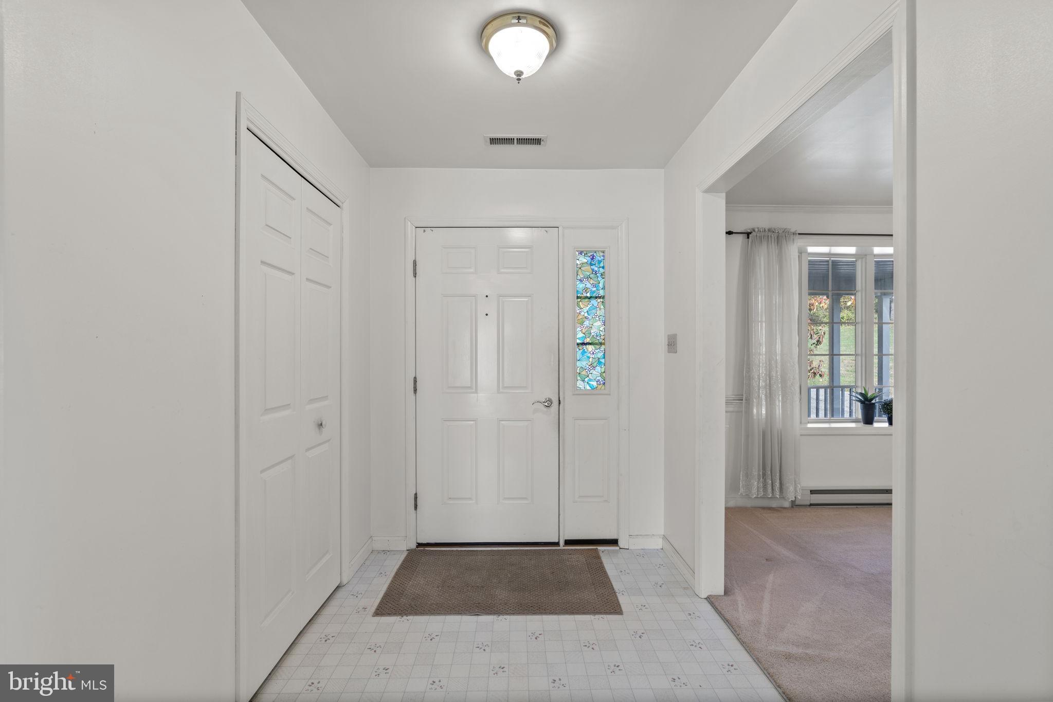 5715 Emory Road Upperco, MD 21155 - Photo 26 of 43 an empty room with windows and closet