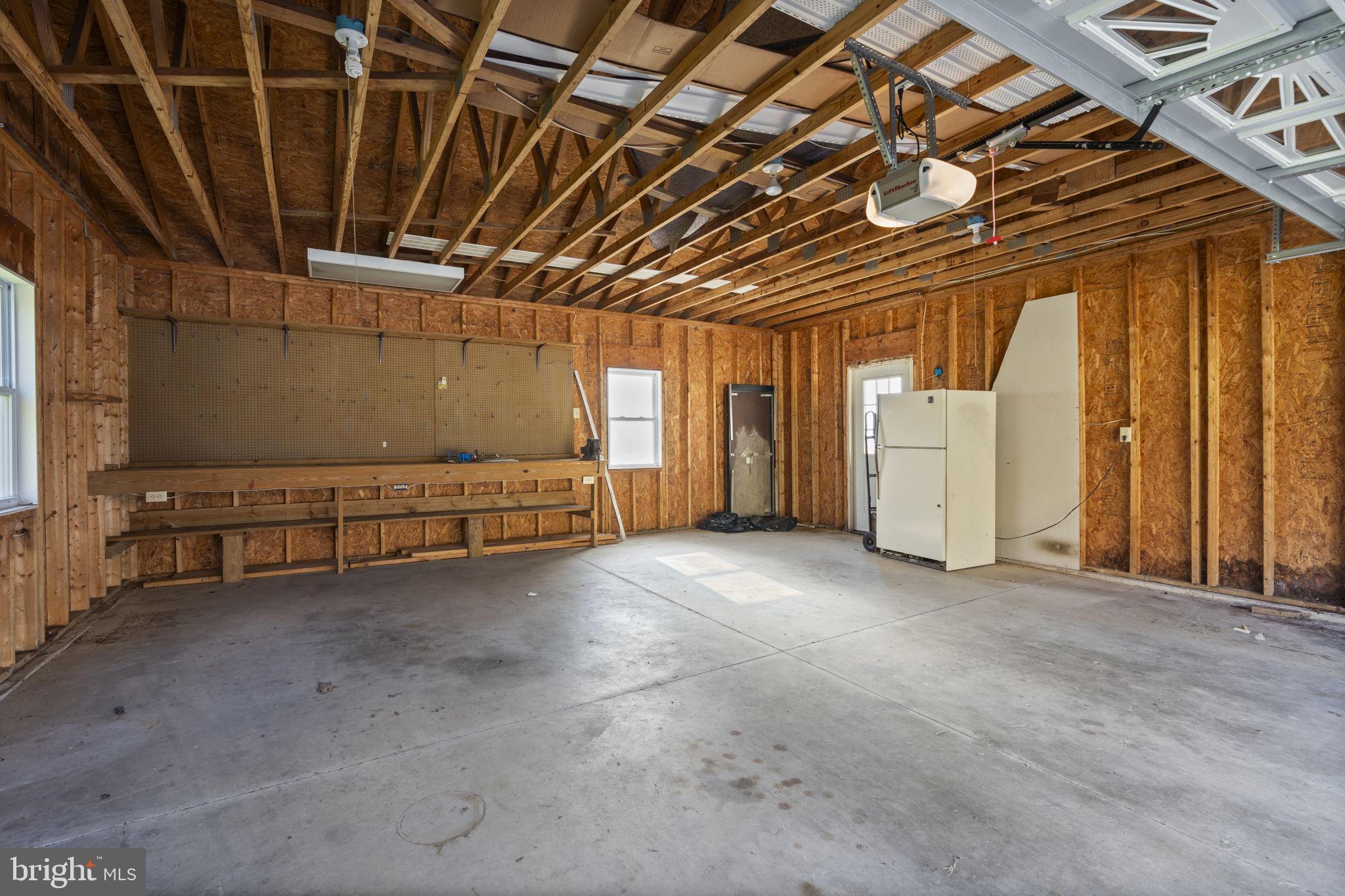 5715 Emory Road Upperco, MD 21155 - Photo 36 of 43 a view of a room with refrigerator