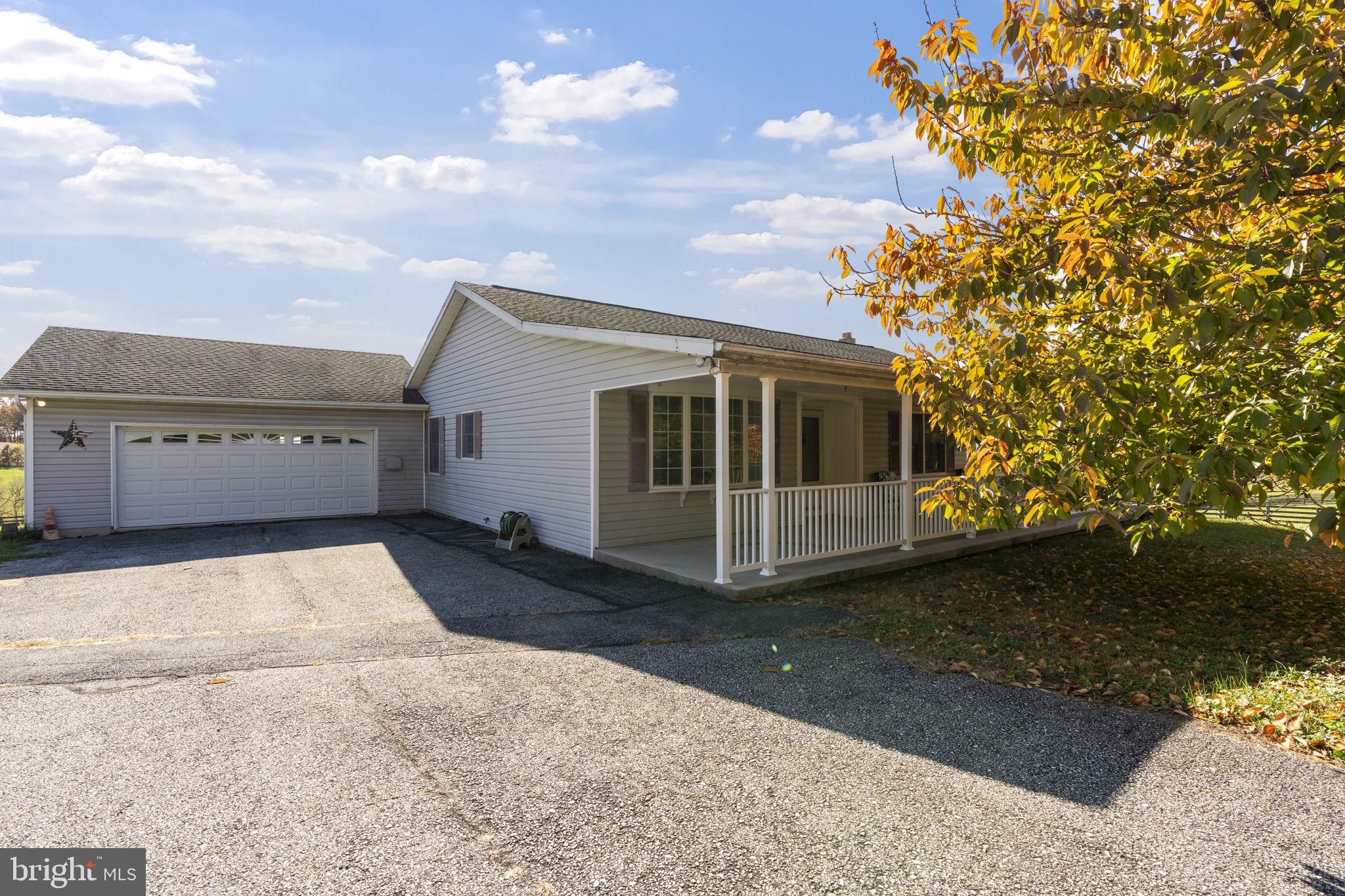 5715 Emory Road Upperco, MD 21155 - Photo 38 of 43 a view of a house with a yard