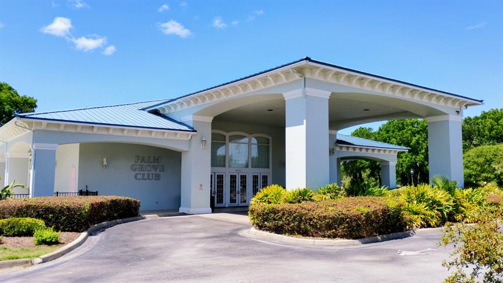 11591 Southwest 78th Avenue Ocala, FL 34476 - Photo 23 of 23 a front view of a house with a yard