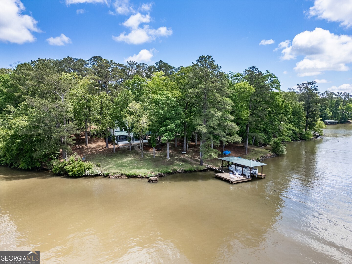 2000 Campbell Road Covington, GA 30014 - Photo 13 of 80 a view of a lake with boats and trees