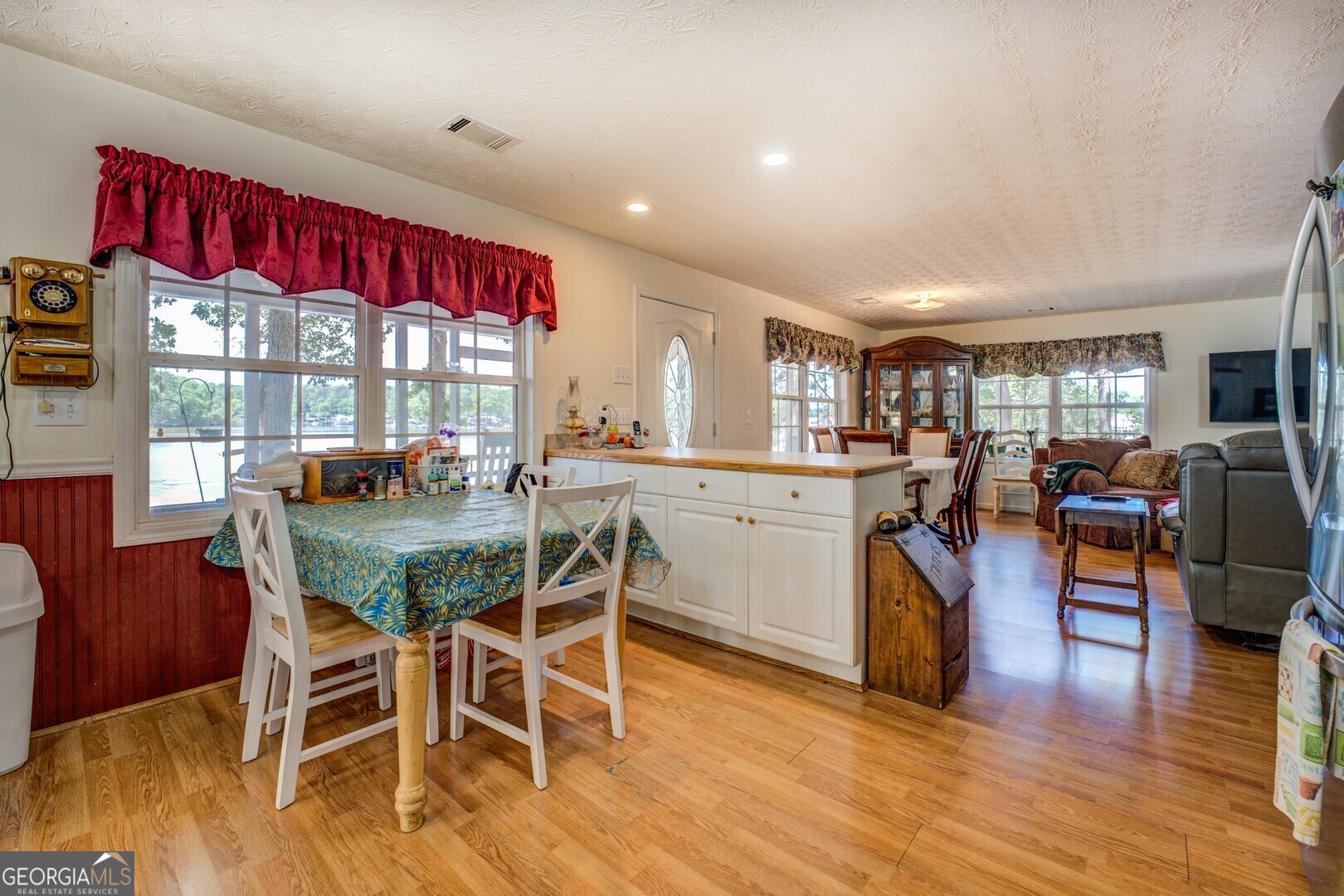 2000 Campbell Road Covington, GA 30014 - Photo 19 of 80 a view of a dining room with furniture window and wooden floor