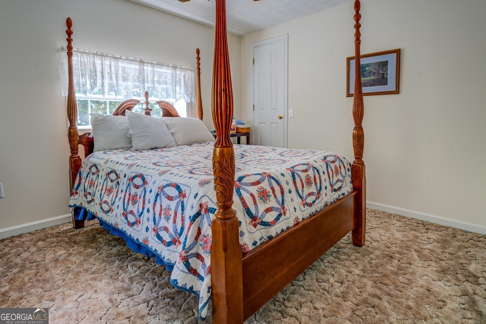 2000 Campbell Road Covington, GA 30014 - Photo 39 of 80 a bedroom with a bed and a window