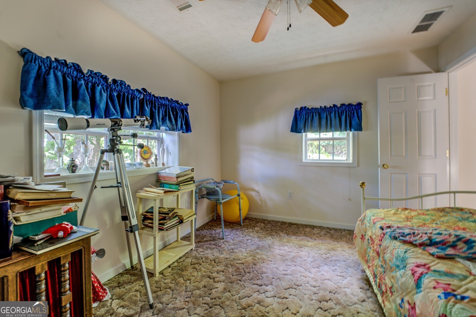 2000 Campbell Road Covington, GA 30014 - Photo 41 of 80 a bedroom with a bed and a painting on the wall