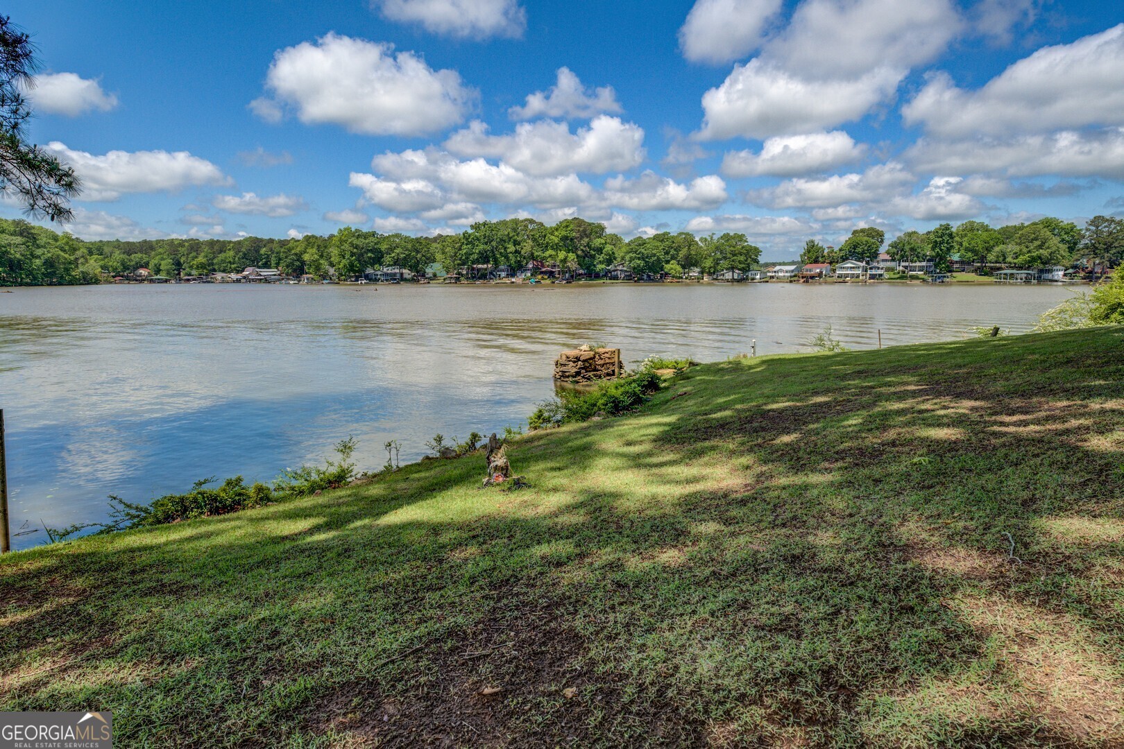 2000 Campbell Road Covington, GA 30014 - Photo 66 of 80 a view of a lake with houses in the back