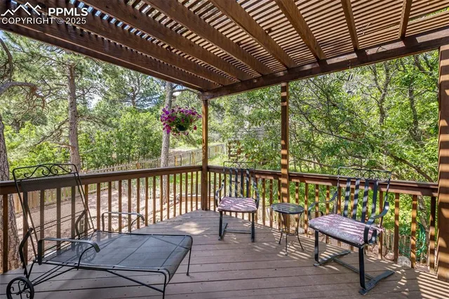 a view of park with iron fence