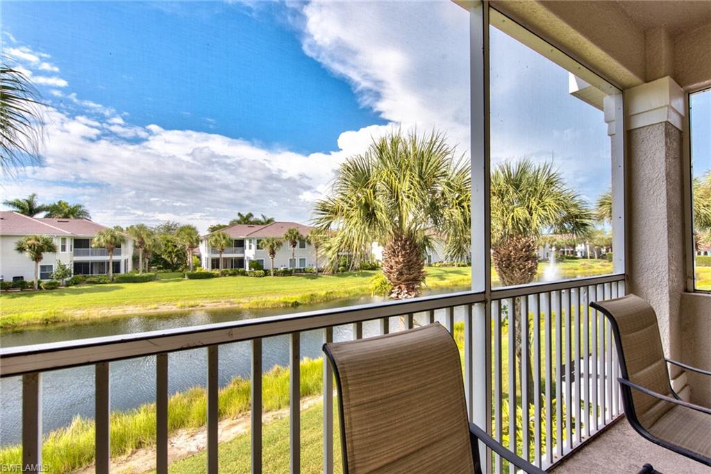 12859 Carrington Circle, Unit 3202 Naples, FL 34105 - Photo 18 of 28 a view of a city from a balcony