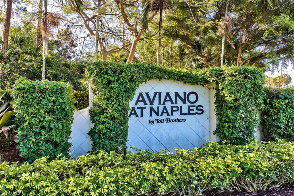 12859 Carrington Circle, Unit 3202 Naples, FL 34105 - Photo 21 of 28 a view of a sign of a park next to a road