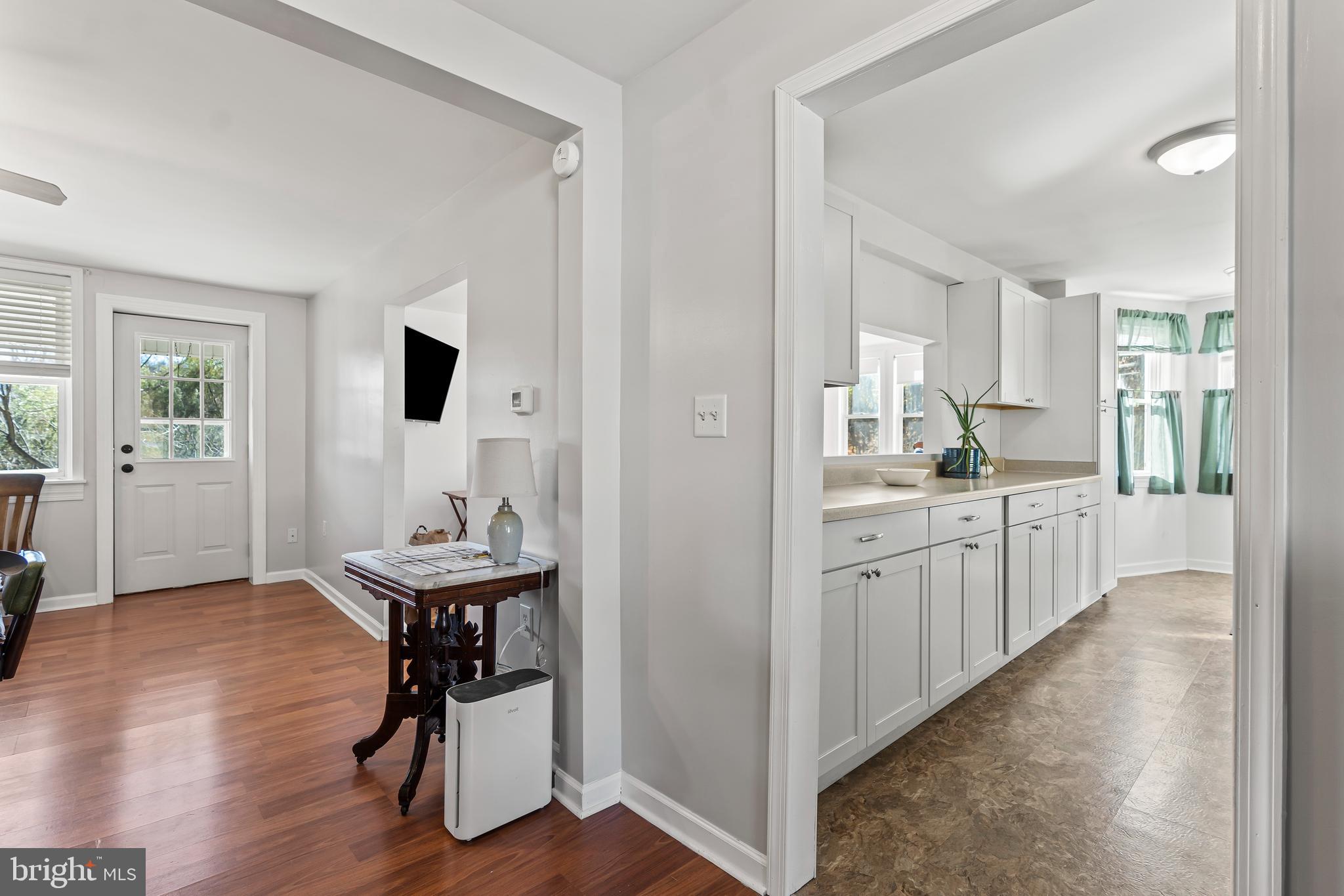 13608 Maryland Avenue Blue Ridge Summit, PA 17214 - Photo 14 of 80 a kitchen with sink cabinets and wooden floor