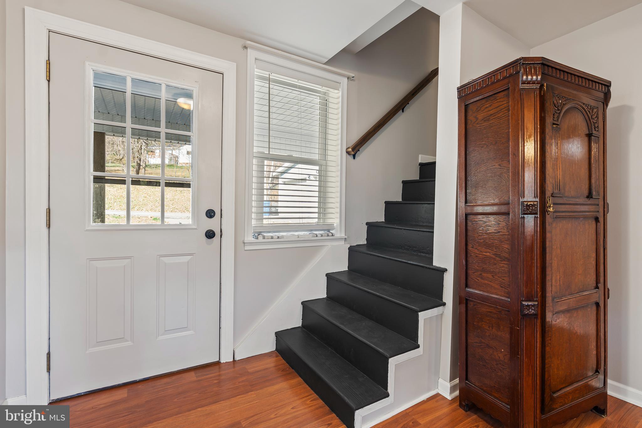 13608 Maryland Avenue Blue Ridge Summit, PA 17214 - Photo 15 of 80 a view of entryway with wooden floor and front door