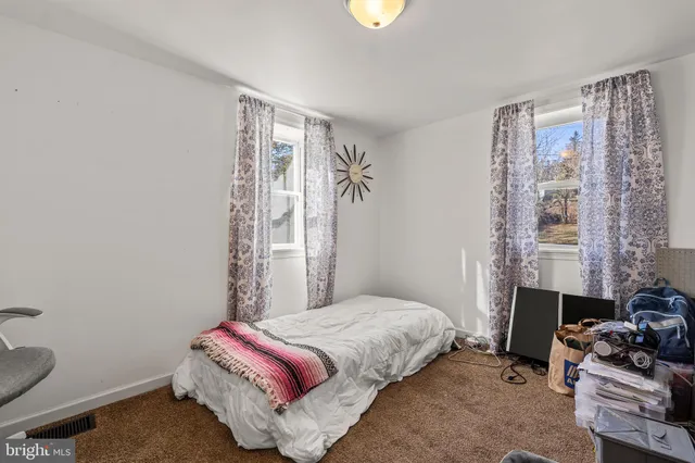 a view of a swimming pool with an outdoor space