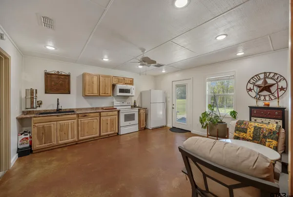 a view of livingroom with furniture and windows