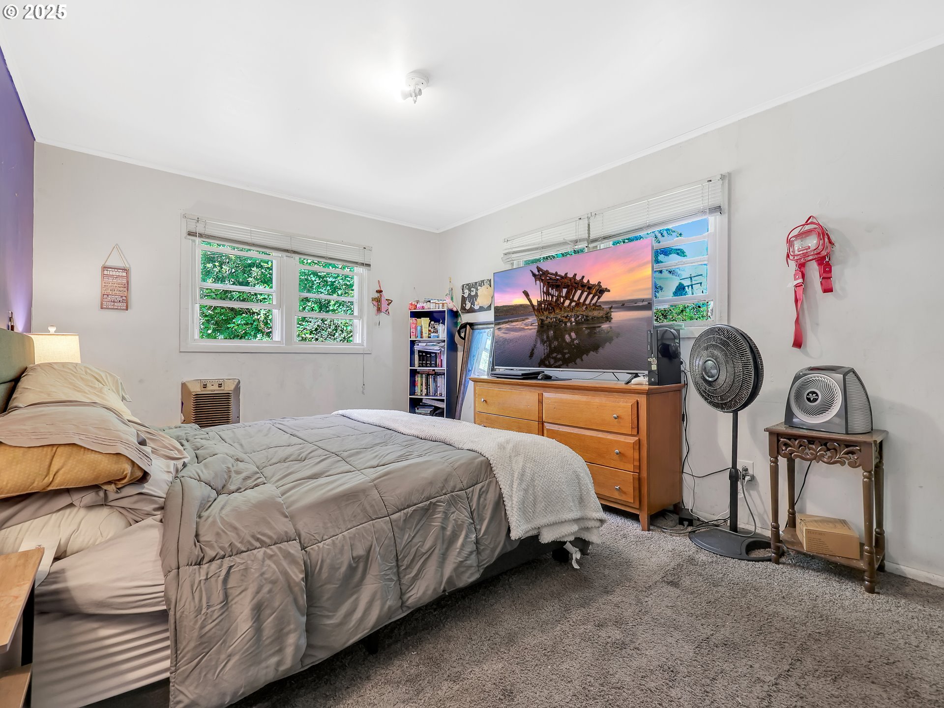 43018 Hillcrest Loop Astoria, OR 97103 - Photo 17 of 27 a bedroom with a bed and a closet