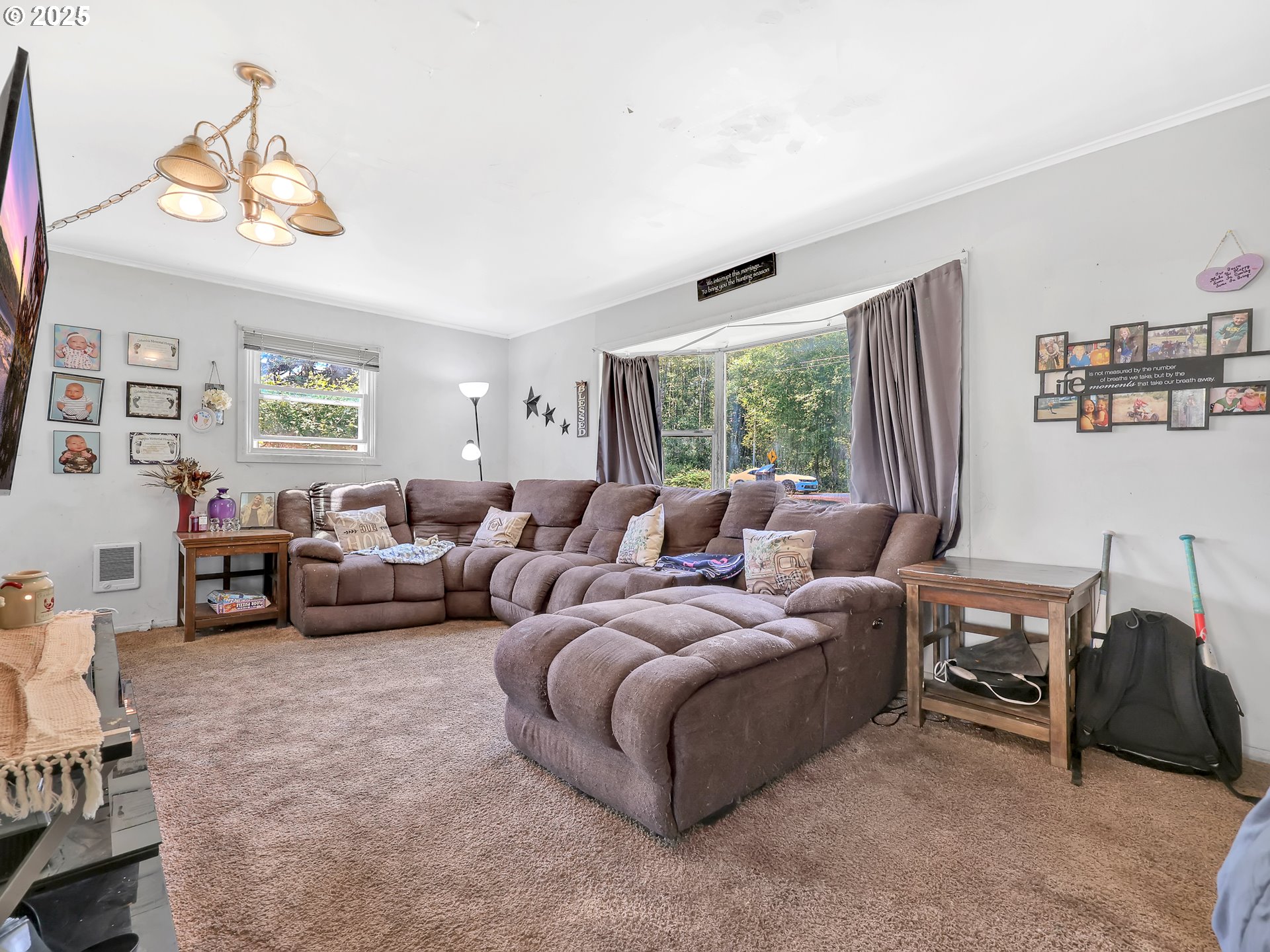 43018 Hillcrest Loop Astoria, OR 97103 - Photo 5 of 27 a living room with furniture and a window