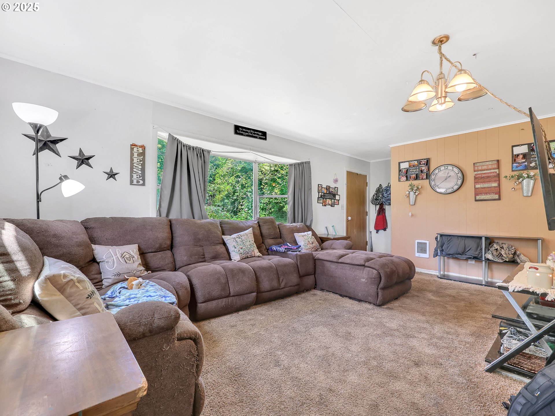 43018 Hillcrest Loop Astoria, OR 97103 - Photo 6 of 27 a living room with furniture and a window