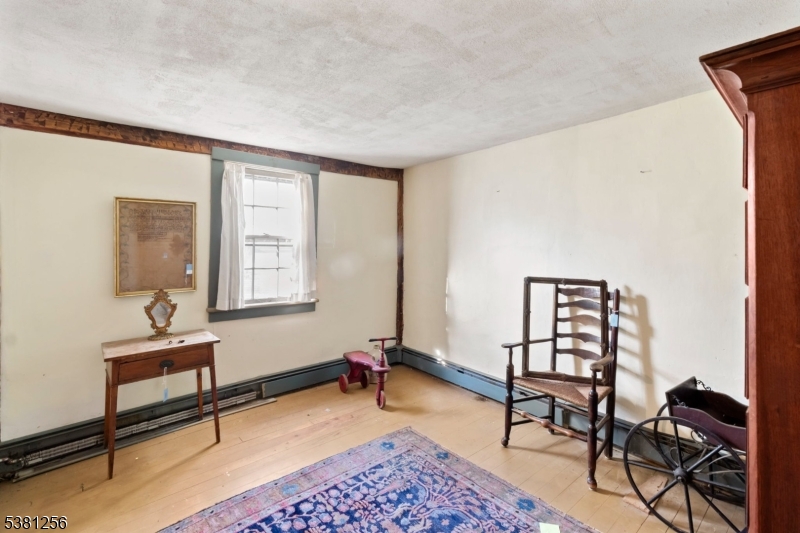 2481 Belvidere Road Phillipsburg, NJ 08865 - Photo 13 of 37 a living room with furniture and a window
