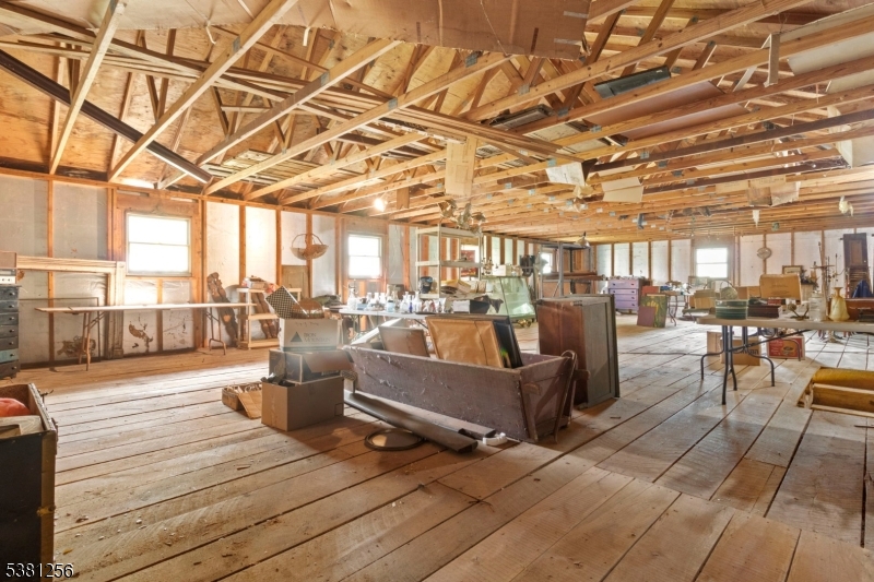 2481 Belvidere Road Phillipsburg, NJ 08865 - Photo 31 of 37 a living room with lots of furniture and wooden floors