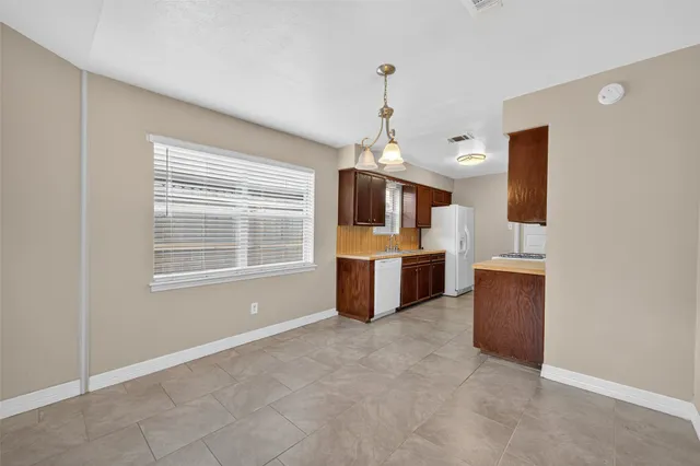 a view of kitchen and microwave