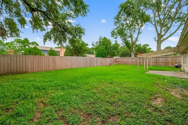 a view of a backyard with a garden